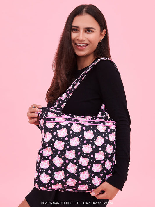 Hello Kitty® × JuJuBe Cherry Blossoms Be Light Diaper Bag Tote — Black and Pink