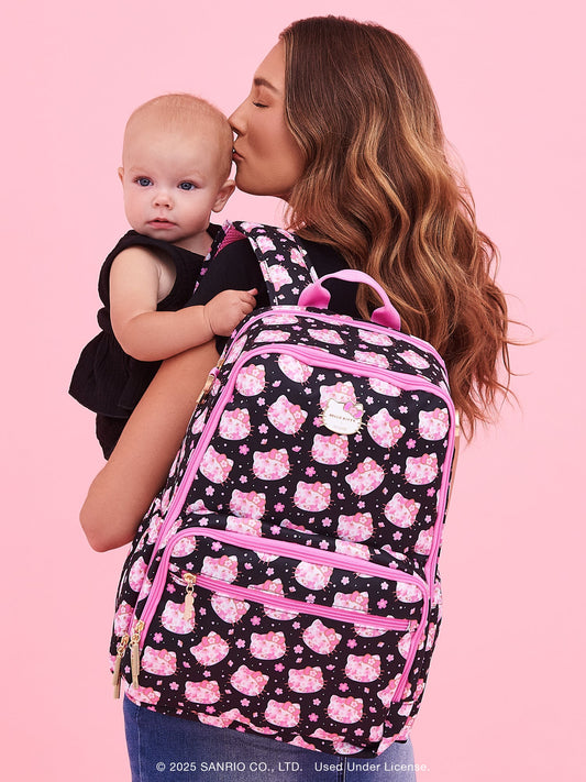 Hello Kitty® × JuJuBe Cherry Blossoms Zealous Backpack Diaper Bag — Black and Pink