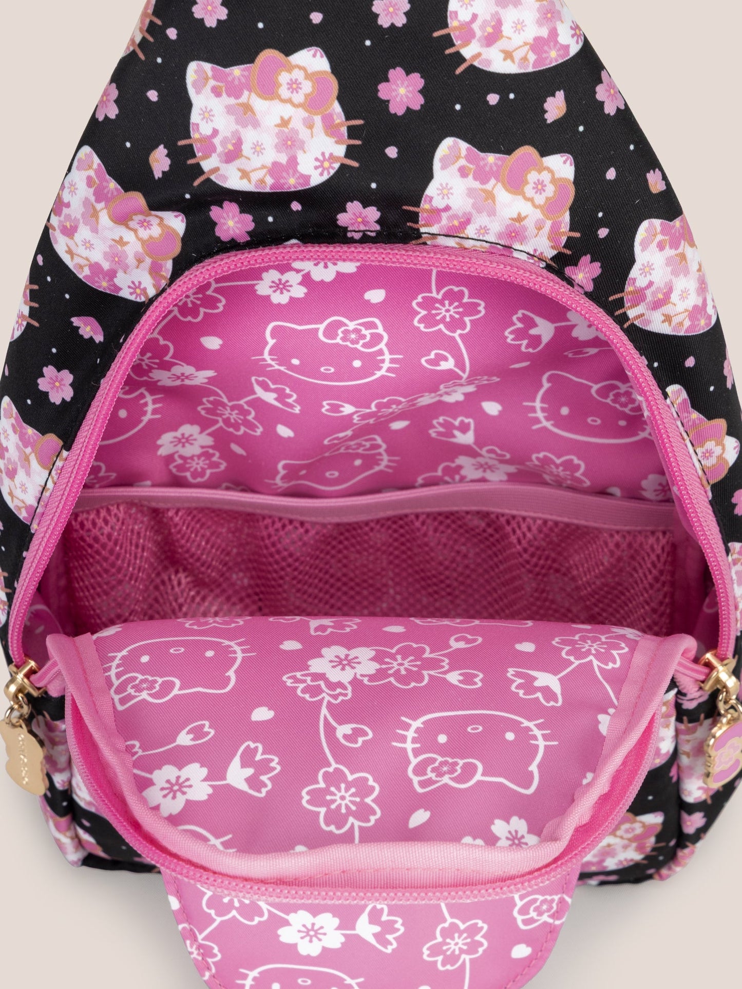 Hello Kitty® × JuJuBe Cherry Blossoms Crossbody Sling Diaper Bag — Black and Pink